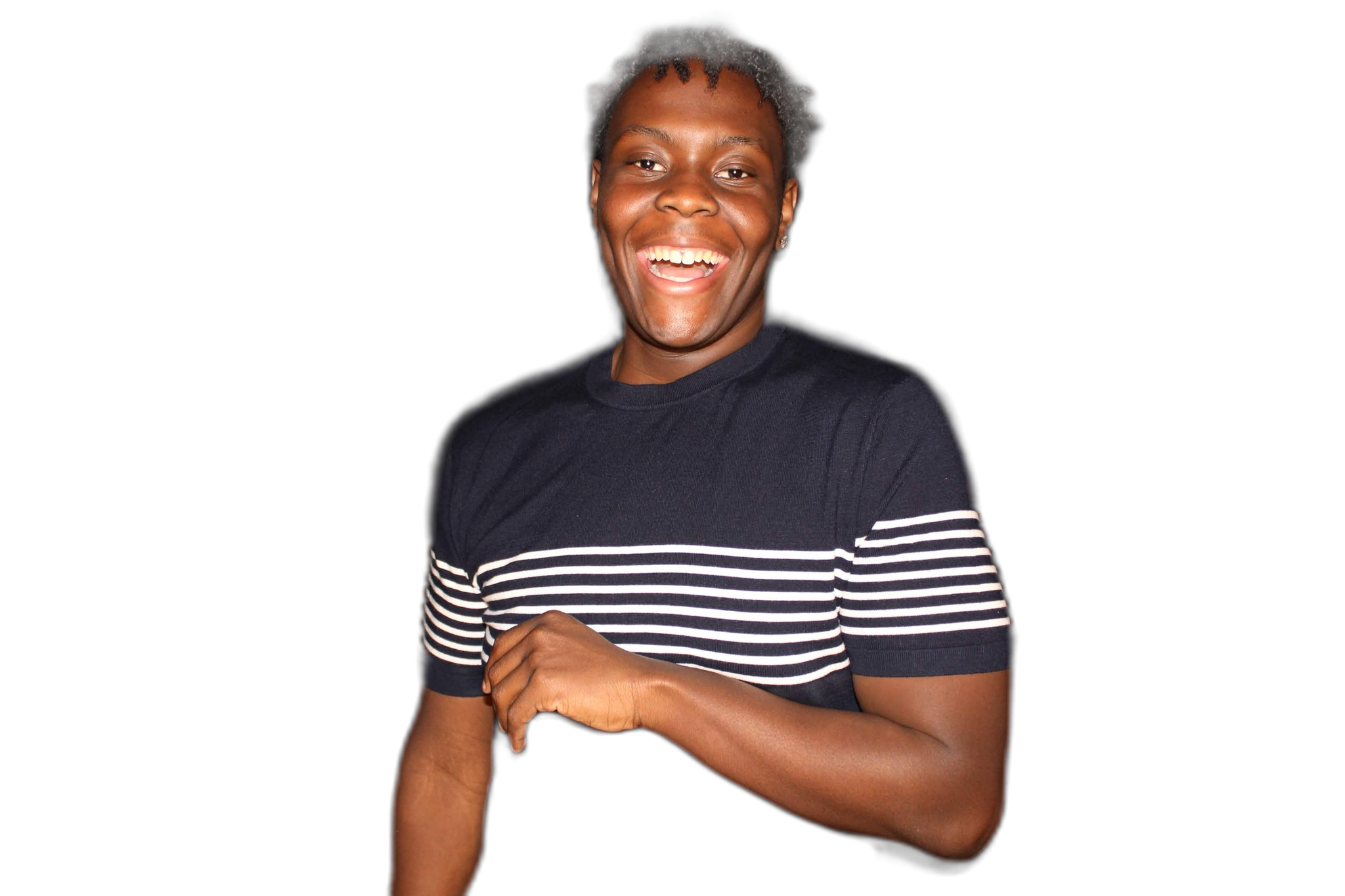 Caleb Jakes smiling in a navy shirt with white stripes